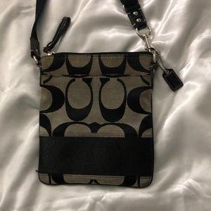 Coach crossbody black and tan bag